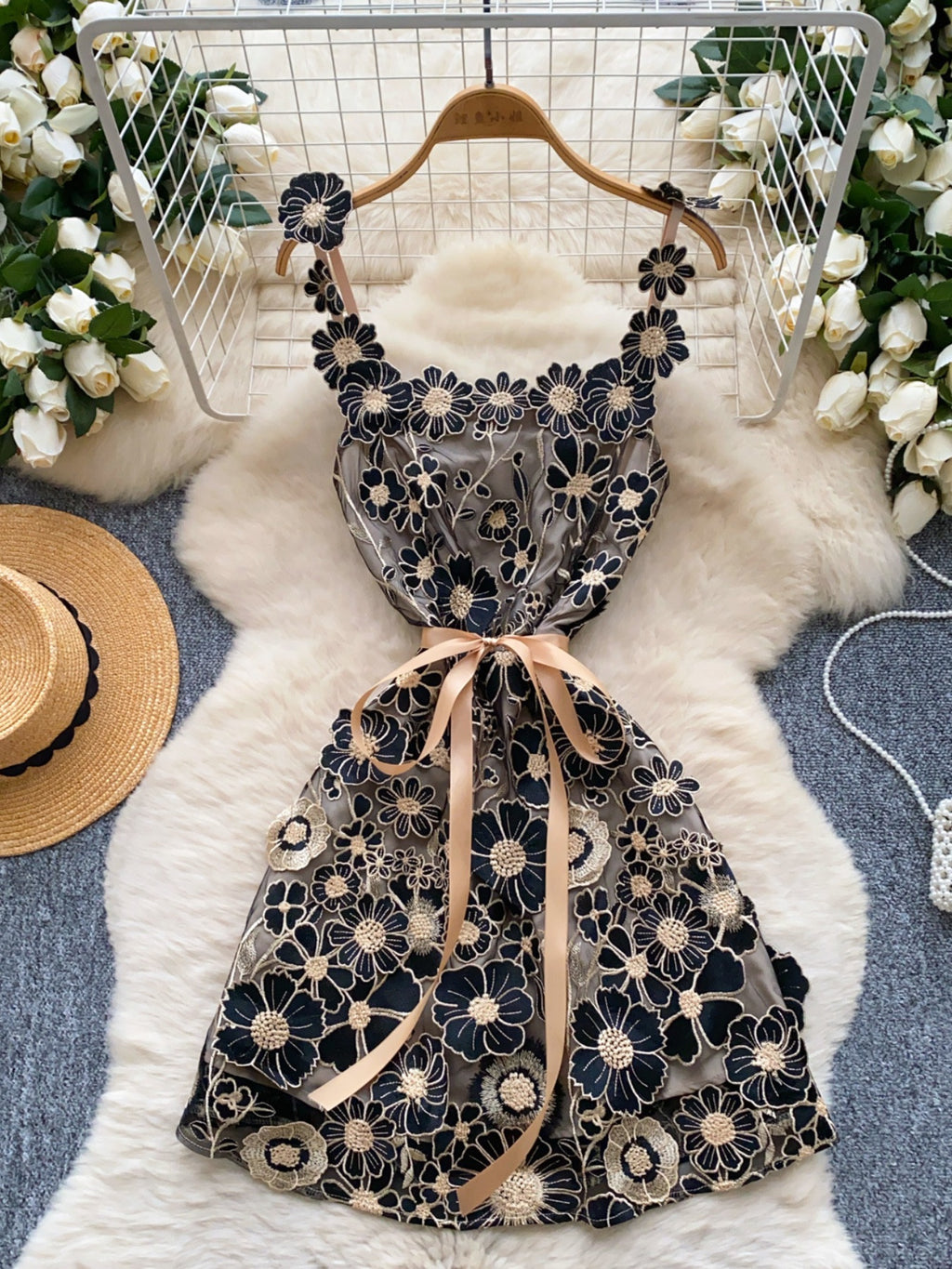 Floral embroidered tie waist mini dress by Trendsi featuring an elegant summer A-line silhouette and vibrant floral details.