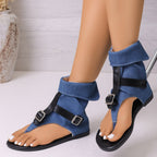 Plush Fashion Hub toe post buckle sandals with adjustable straps and cushioned footbed shown from a front angle.