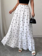 Maxi skirt with bowknot print and ruffle hem by Trendsi, featuring a flowy design and stylish pattern.