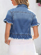 Light blue denim jacket with ruffle hem and short sleeves, from Plush Fashion Hub, displayed on a hanger.