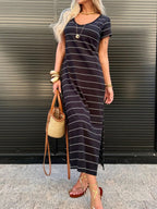 Women's striped side slit cotton midi T-shirt dress by Trendsi, featuring a relaxed fit and casual style.