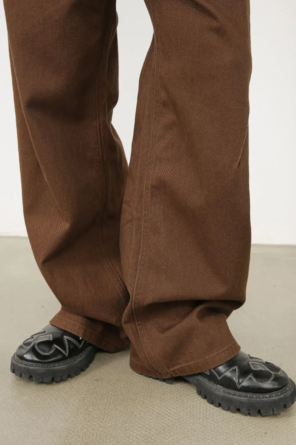 Men's loose fit jeans by Trendsi featuring classic denim style, relaxed fit, and visible stitching on a neutral background.