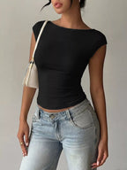 Lace detail cap-sleeve T-shirt from Trendsi, white with delicate lace accents on the sleeves and neckline.