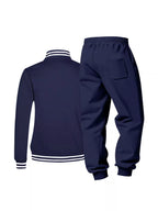 Men's plus size striped snap-down top and pants set by Trendsi, featuring bold pattern and comfortable fit.