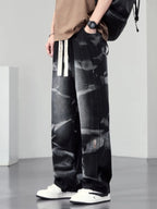 Men's plus size washed wide-leg jeans by Trendsi, featuring relaxed fit and distressed denim, displayed on a plain background.