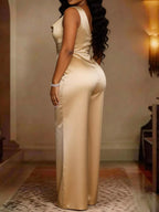 Plus size cowl neck wide-leg jumpsuit by Trendsi, featuring a stylish full size design with a relaxed fit and elegant silhouette.