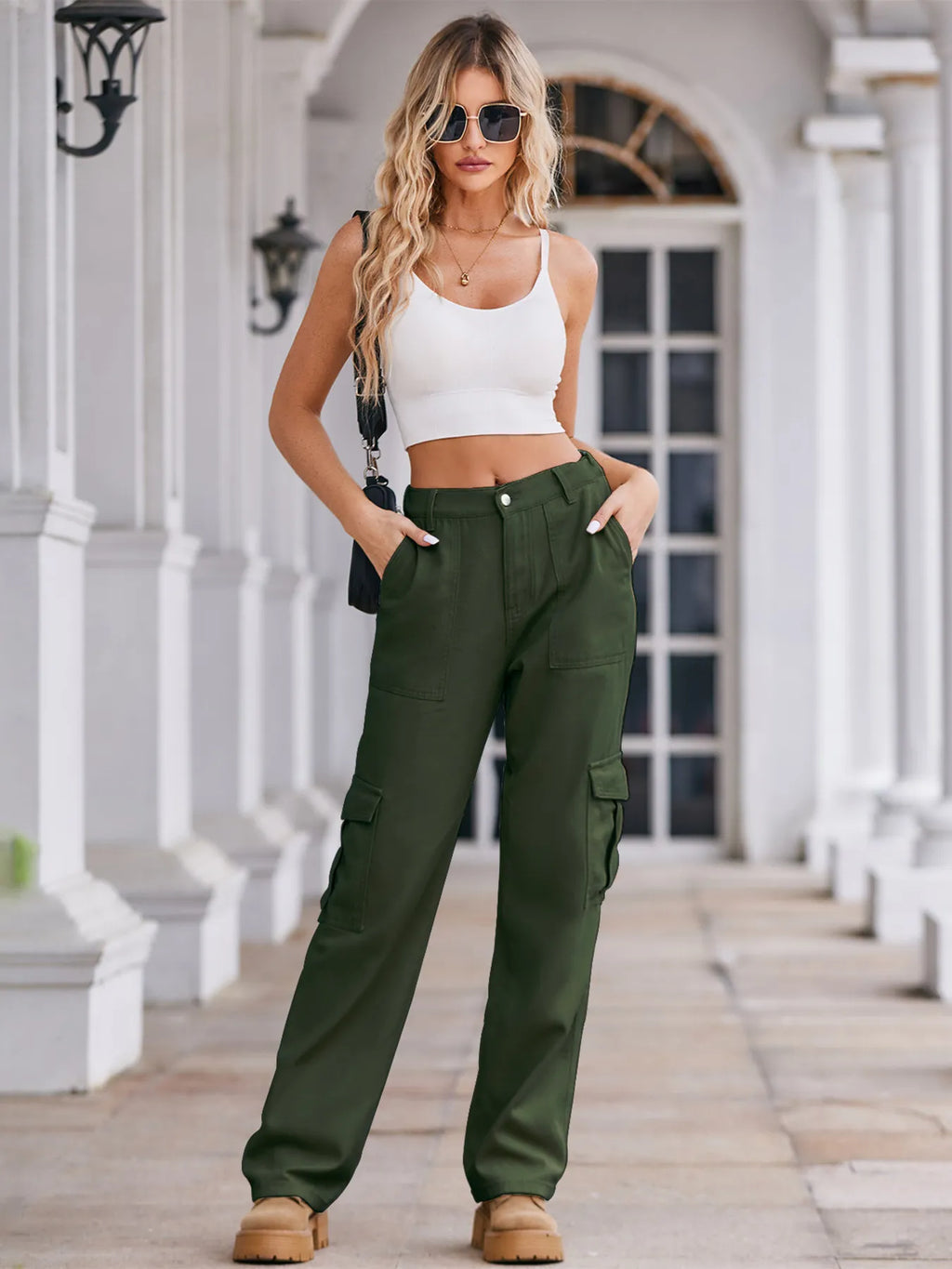 High-waisted cargo denim jeans from Plush Fashion Shop displayed on a model, featuring multiple pockets and a stylish fit.