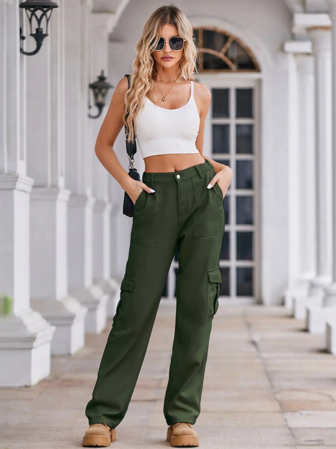High-waisted cargo denim jeans from Plush Fashion Shop displayed on a model, featuring multiple pockets and a stylish fit.