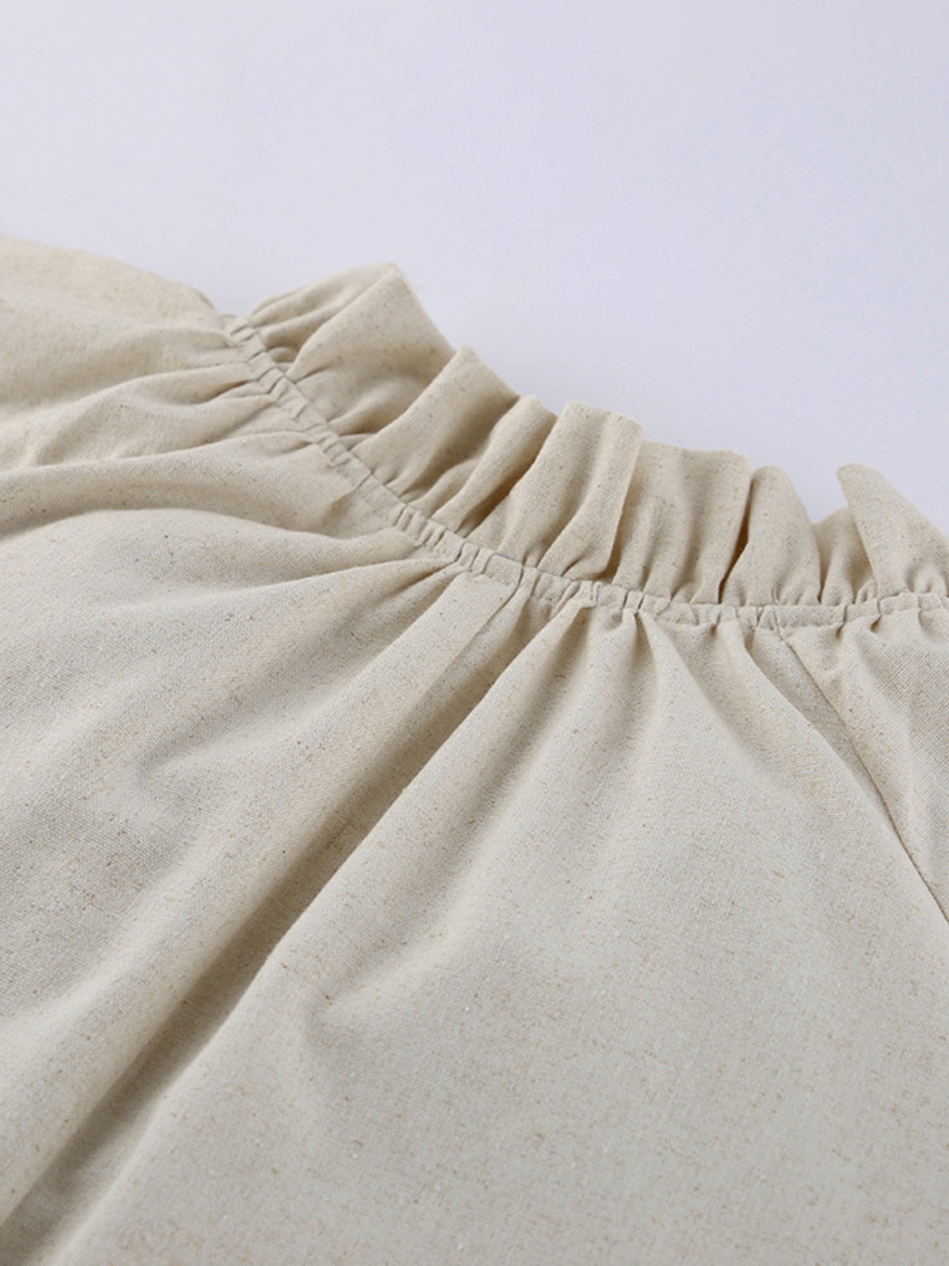 Cotton linen maxi dress with tie neck and flounce sleeves, stylish and flowy, from Trendsi.