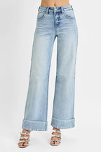 High-rise tummy control wide cuffed ankle jeans by Plush Fashion Hub in stretchy denim with a fitted waist and cuffed ankles.
