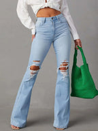 Distressed jeans with front and back pockets from Trendsi, featuring a casual, worn-in denim look and stylish details.