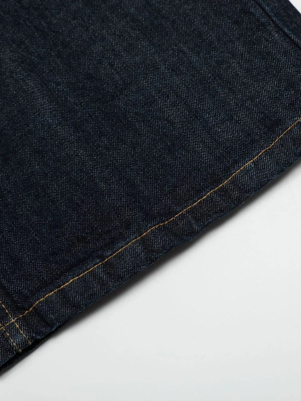 Men's wide leg denim jeans by Plush Fashion Shop, showing a relaxed fit with classic blue denim fabric and stitching details.