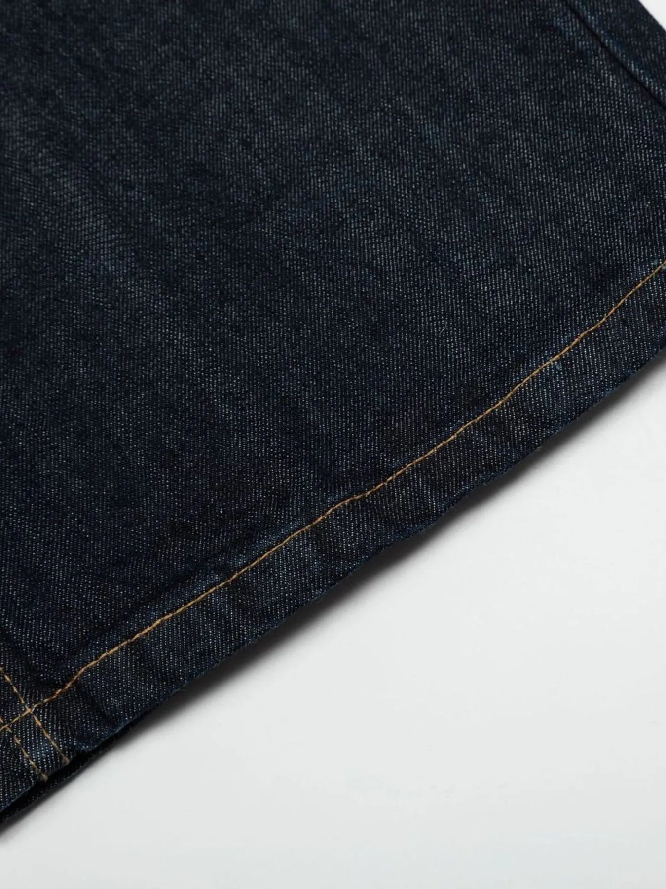Men's wide leg denim jeans by Plush Fashion Shop, showing a relaxed fit with classic blue denim fabric and stitching details.