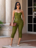 Black belted tube skinny jumpsuit from Trendsi featuring a fitted silhouette and sleeveless design, shown on a model.