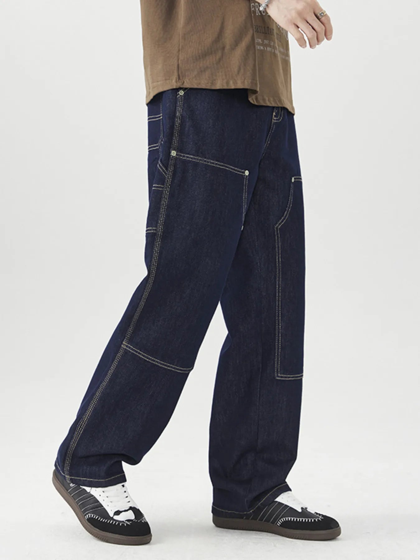 Men's wide-leg cargo jeans by Trendsi, featuring durable fabric and spacious fit, shown in a stylish casual look.