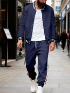 Plus size men's striped snap-down top and matching pants set by Trendsi, casual and stylish outfit.