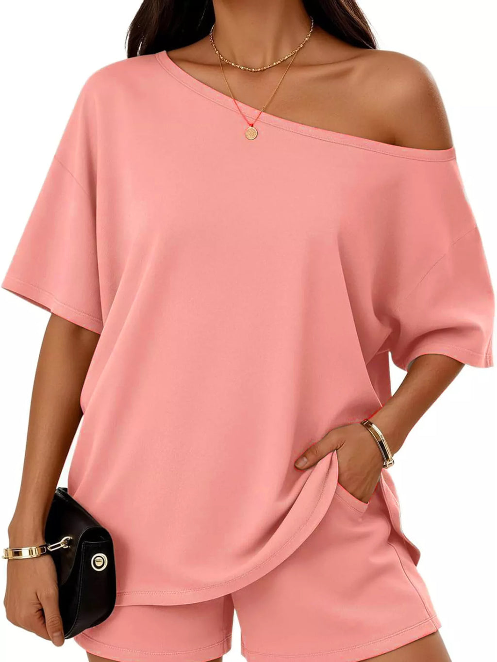 Plus size full size one-shoulder top and shorts set by Trendsi, featuring a stylish, coordinated casual outfit with a modern design.