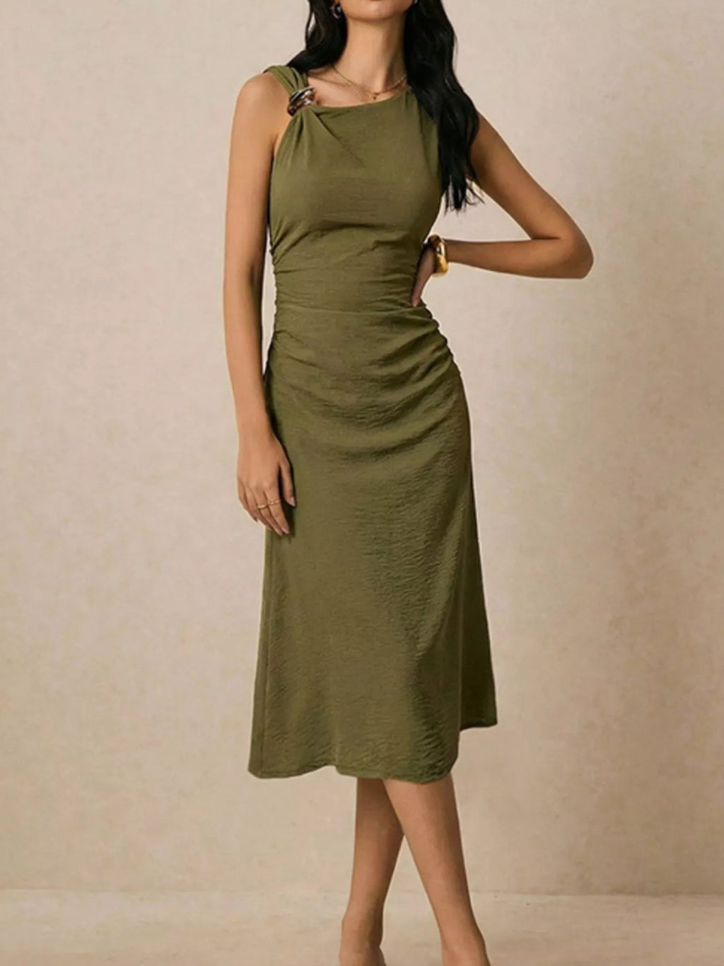 Asymmetrical neck ruched midi dress by Trendsi featuring a fitted silhouette and elegant draping, shown on a model.