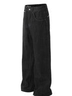 Men's wide leg denim jeans from Plush Fashion Shop, showing the relaxed fit and classic blue denim fabric.