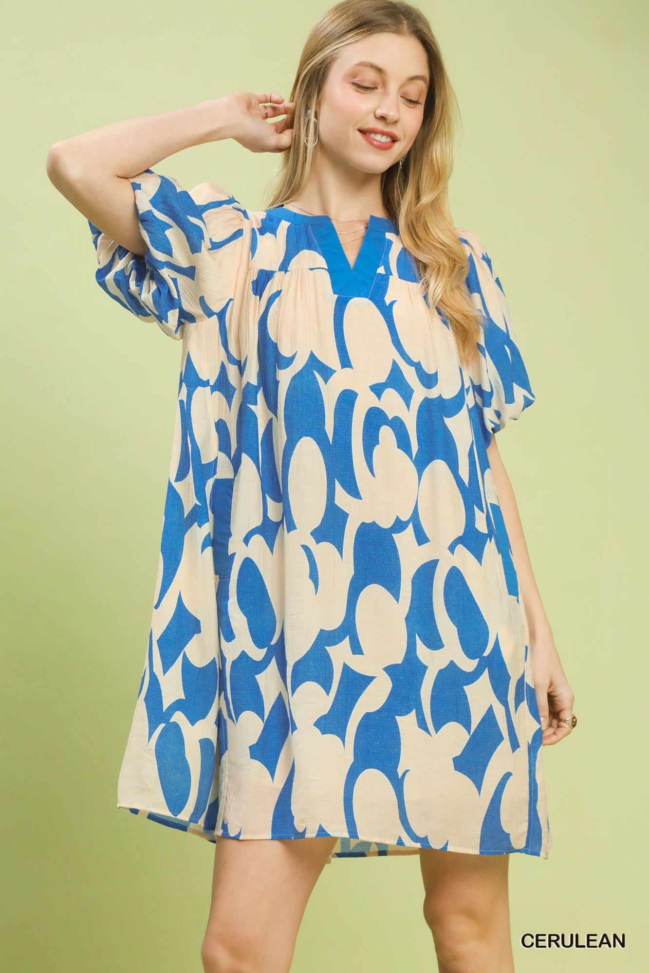 Abstract print puff sleeve shift dress from Trendsi featuring a relaxed bohemian style mini dress with a modern, artistic design.