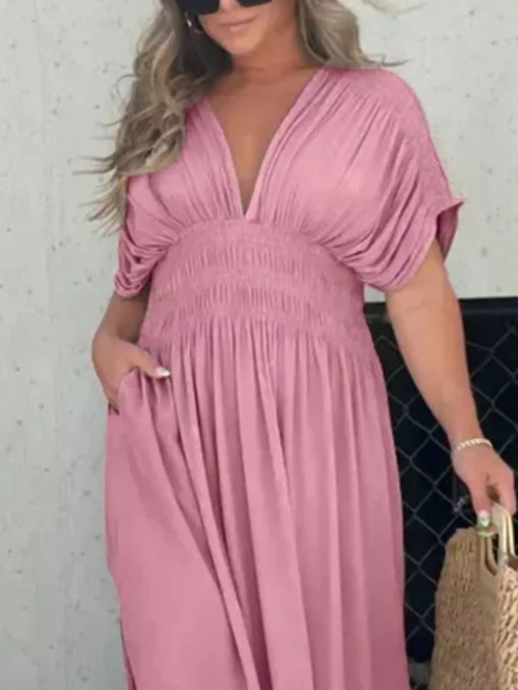 Plus size maxi dress by Trendsi featuring a slit V-neck, smocked waist, and full-length design perfect for elegant summer wear.