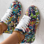 Women’s FitiqueFit round-toe thick-sole lace-up sneakers with casual printed design, showcasing their stylish footwear style.