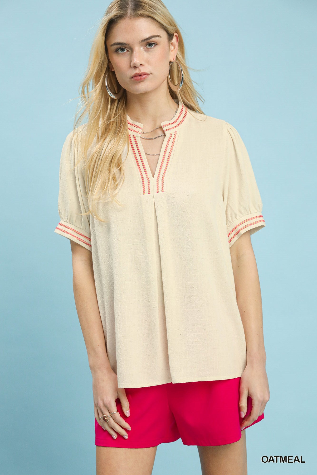 Embroidered linen puff sleeve blouse for women featuring breathable cotton blend fabric and intricate embroidery details.