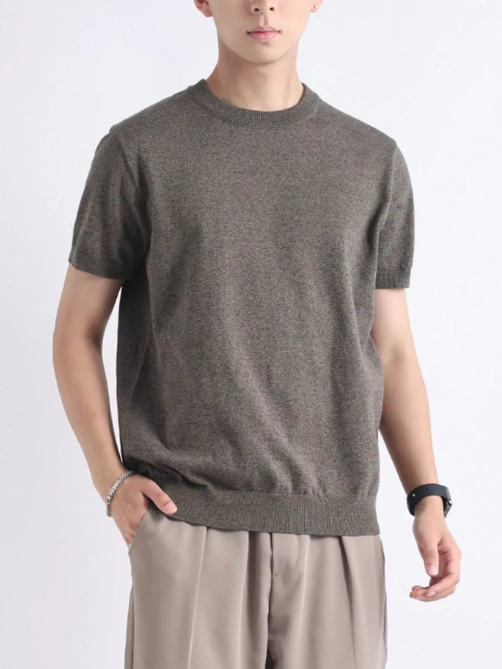 Men's plus size casual knitted short sleeve T-shirt by Trendsi, featuring a comfortable, stylish fit in a soft fabric.