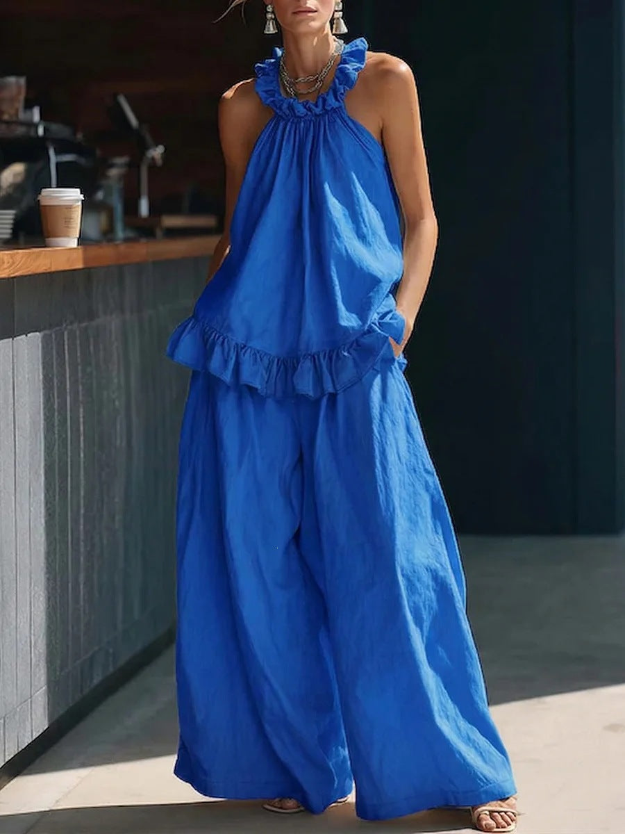 Halterneck loose two-piece casualwear set by FitiqueFit featuring pleated top and asymmetric pocket pants.