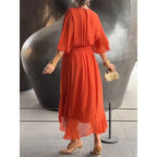 Plush Fashion Hub batwing sleeve V-neck midi dress with tied irregular hem, flowing fairy dress style in soft fabric.