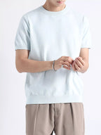 Men's plus size casual knitted short sleeve T-shirt by Trendsi, featuring a comfortable fit and soft knit fabric.