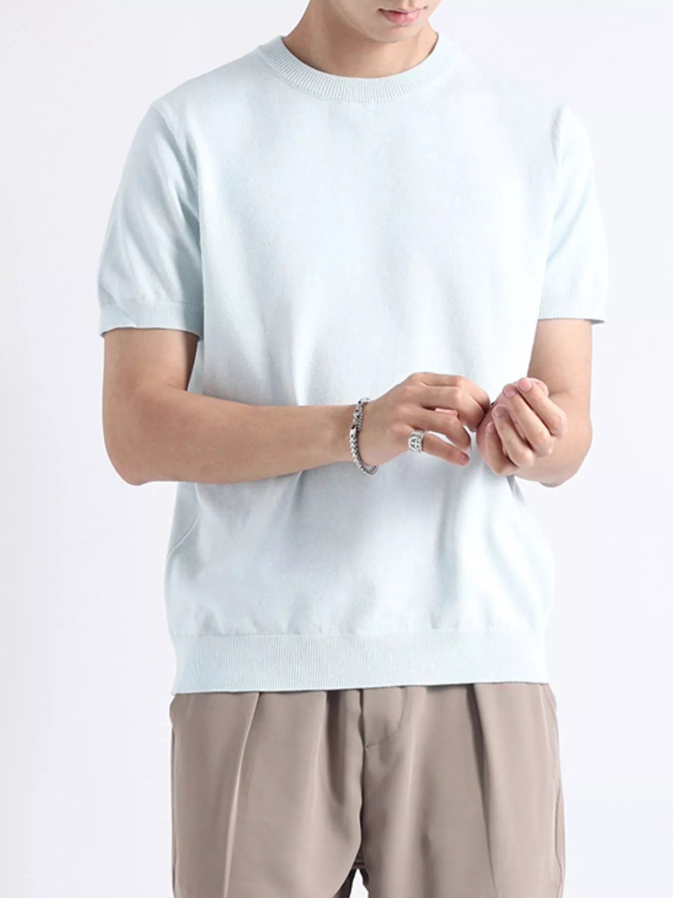 Men's plus size casual knitted short sleeve T-shirt by Trendsi, featuring a comfortable fit and soft knit fabric.
