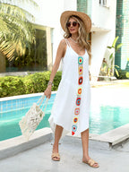 Flowy crochet trim cover-up dress by Trendsi featuring a lightweight fabric and intricate crochet details, perfect for beachwear.