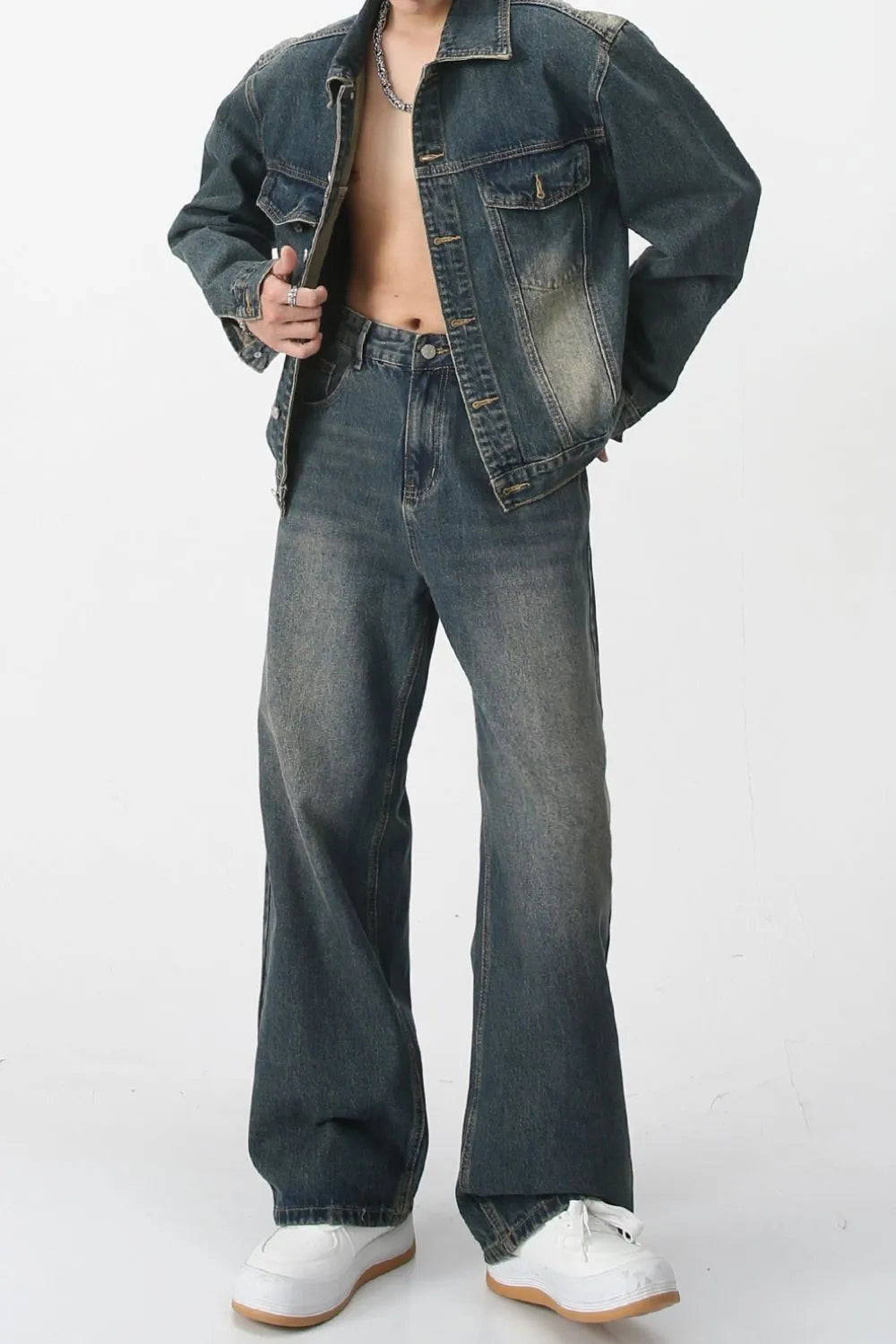 Light blue Plush Fashion Shop baggy denim jeans with multiple front pockets, relaxed fit and classic style.