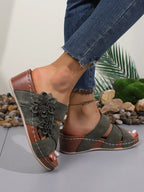 Women's floral crisscross wedge sandals with mid-heel, comfortable summer shoes featuring a stylish flower design and ankle straps.