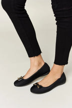 Women's metal buckle flat loafers by Trendsi, stylish and comfortable office and casual flats with sleek design and metal buckle detail.