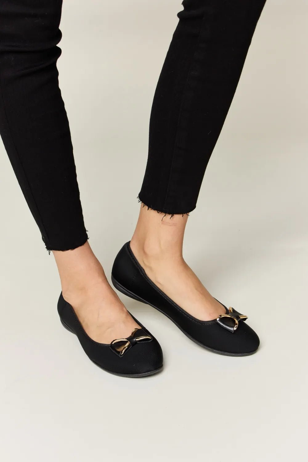 Women's metal buckle flat loafers by Trendsi, featuring a chic design with a metal buckle, comfortable for office and casual wear.