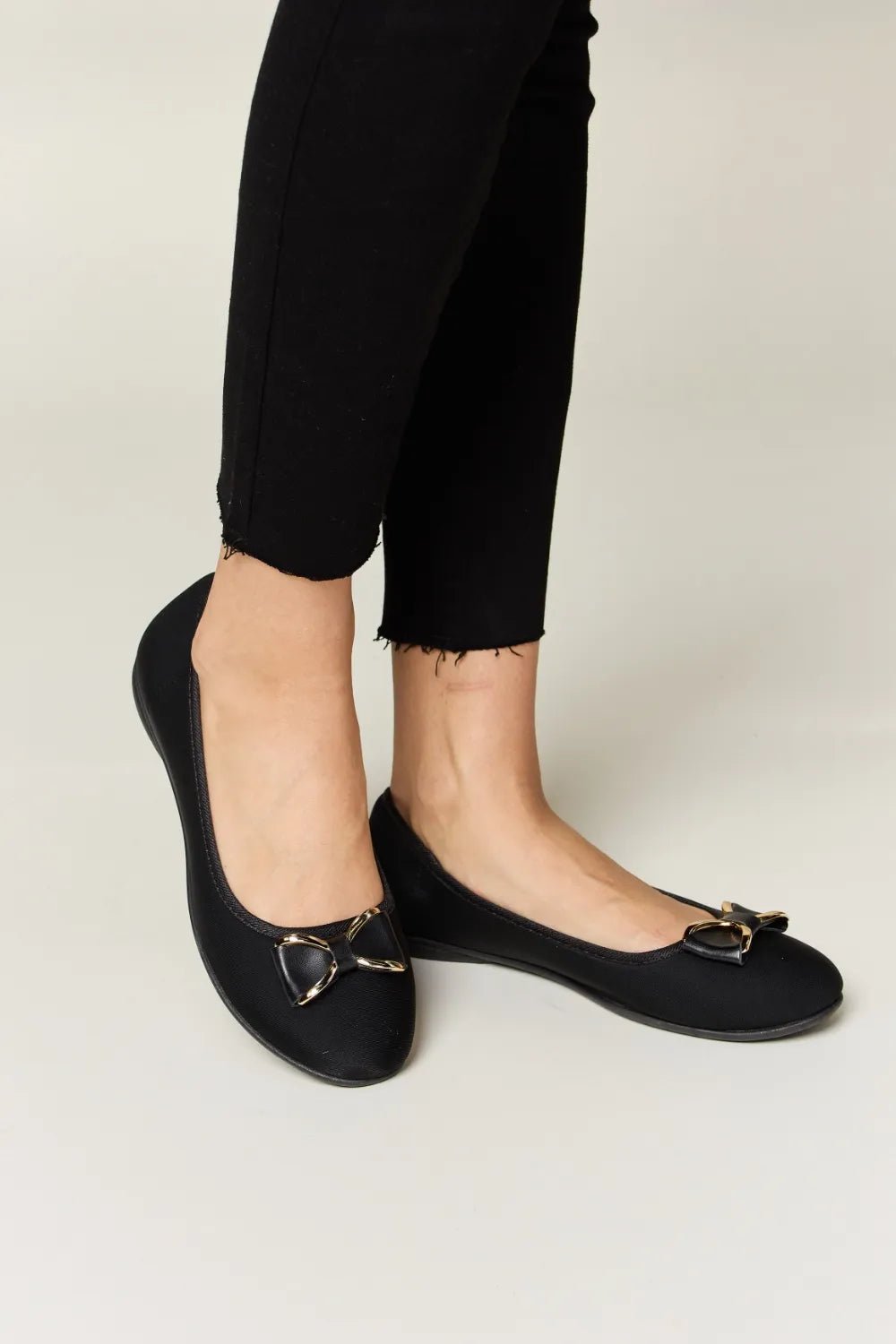 Women's metal buckle flat loafers from Trendsi, featuring a sleek design and comfortable fit for office or casual wear.