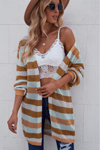 Women's striped openwork long sleeve cardigan by Trendsi, casual knitwear with a relaxed fit and openwork pattern.