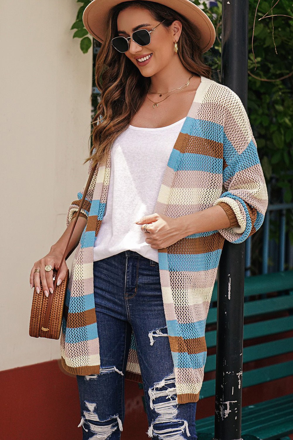 Women’s striped openwork long sleeve cardigan, casual knitwear by Trendsi, featuring a lightweight, open-knit design and relaxed fit.