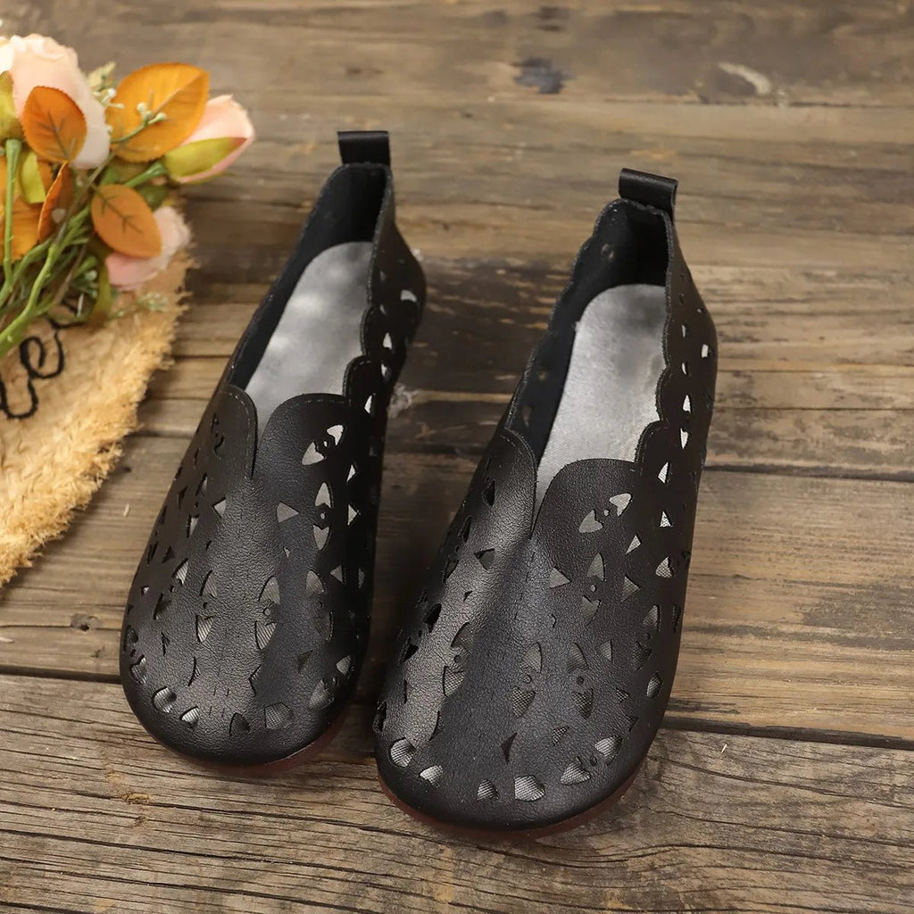 Women's breathable hollow-out casual slip-on shoes by Trendsi, featuring lightweight, flat design and comfortable open-toe style.