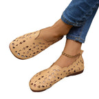 Women's hollow-out breathable casual flat slip-on shoes by Trendsi, featuring lightweight comfort and stylish design.