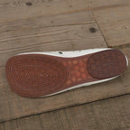 Women’s hollow-out breathable casual flat slip-on shoes by Trendsi, showcasing lightweight comfort and stylish design.