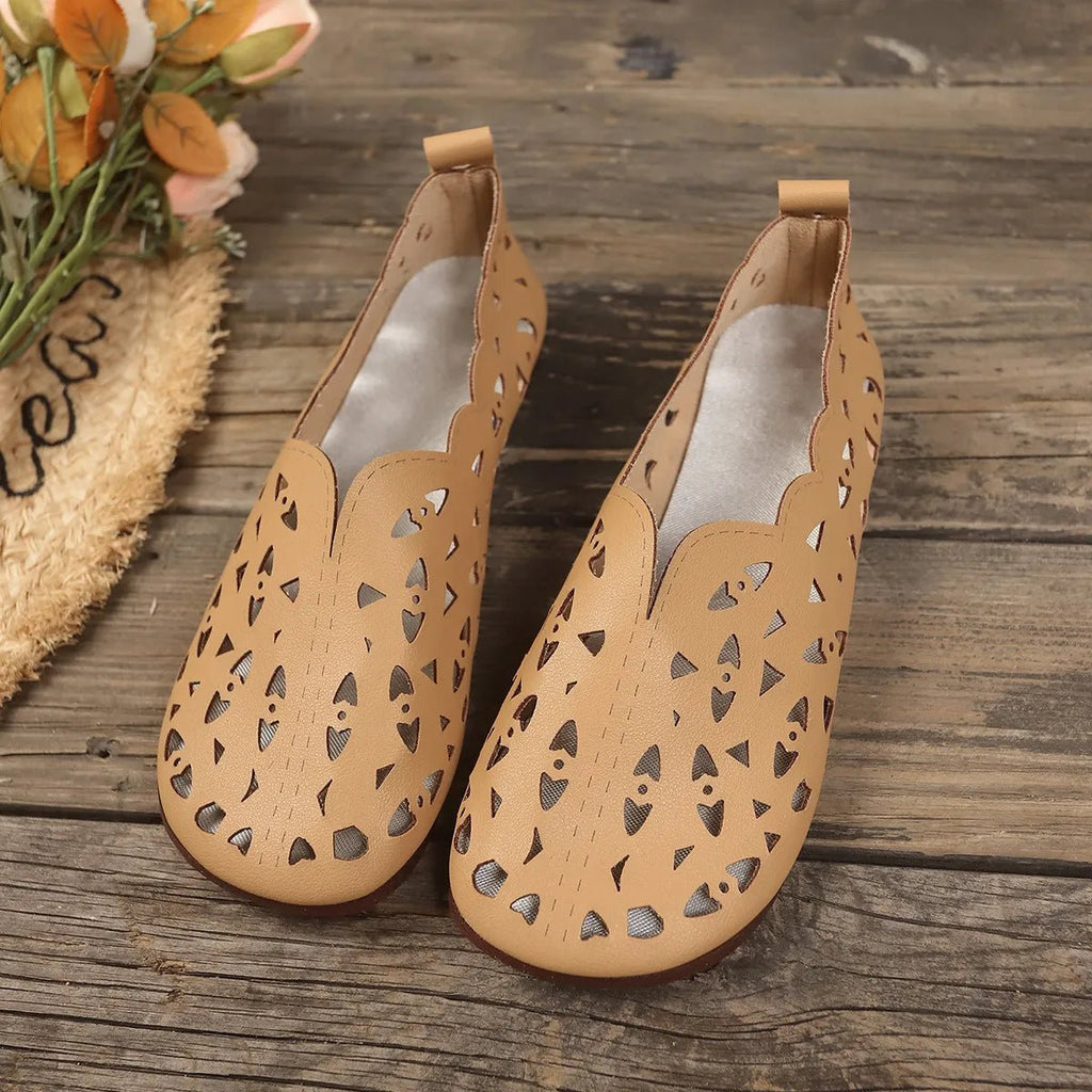 Women's hollow-out breathable casual flat slip-on shoes by Trendsi, featuring lightweight design and comfortable wear.