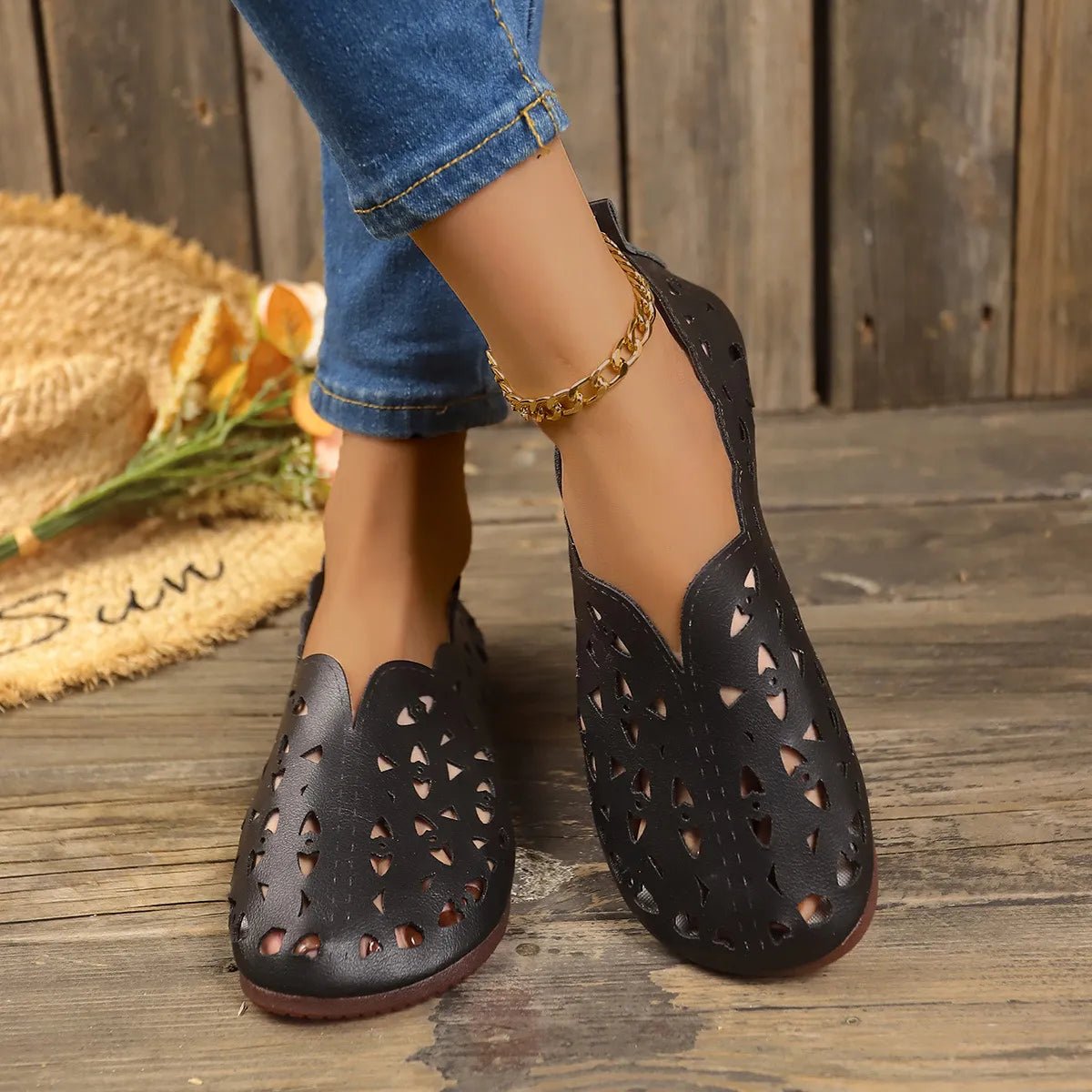 Women's hollow-out breathable casual flat slip-on shoes by Trendsi, featuring lightweight comfort and stylish open design.
