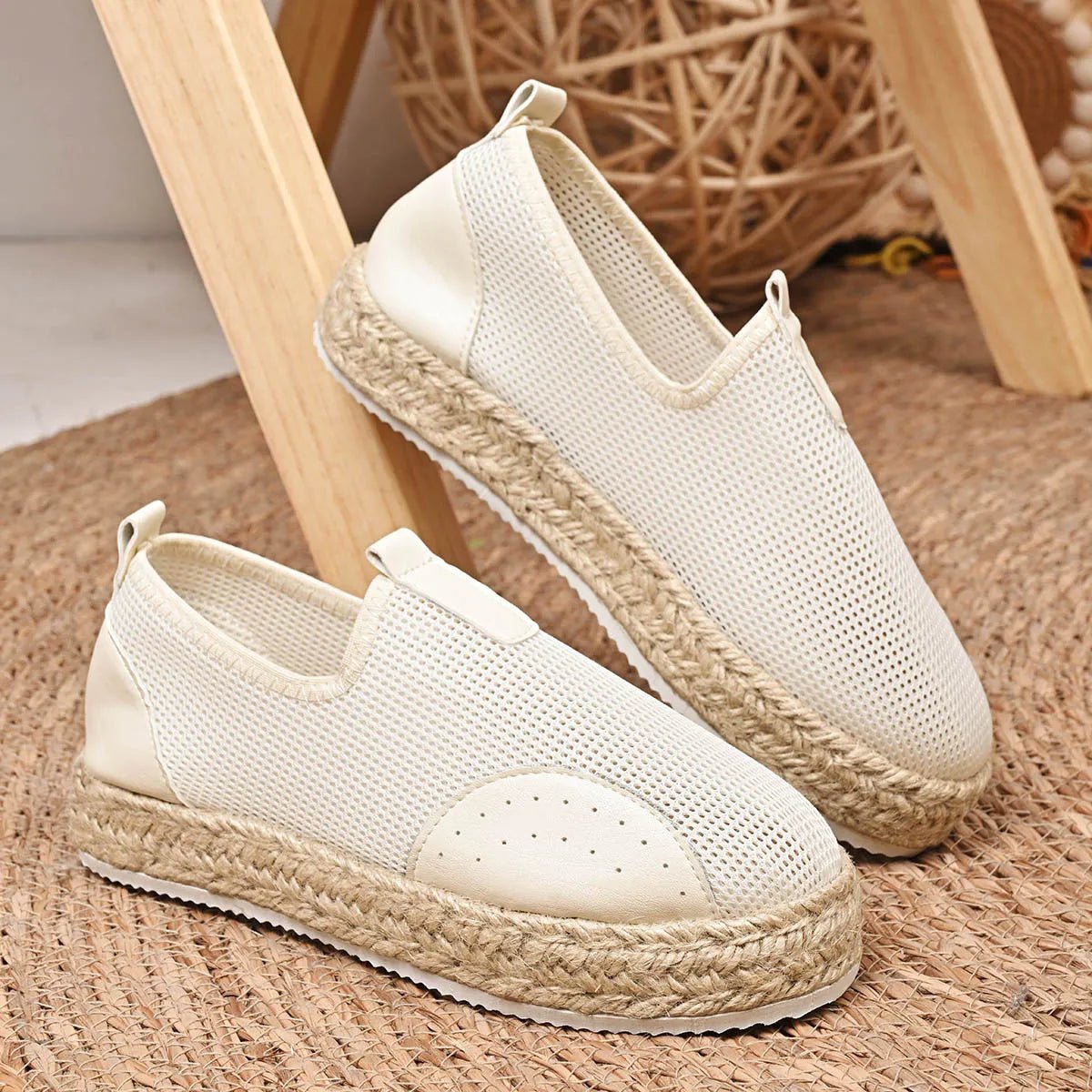 Women's breathable mesh espadrille platform slip-on flats by Trendsi, featuring a comfortable, stylish design with a woven jute sole.