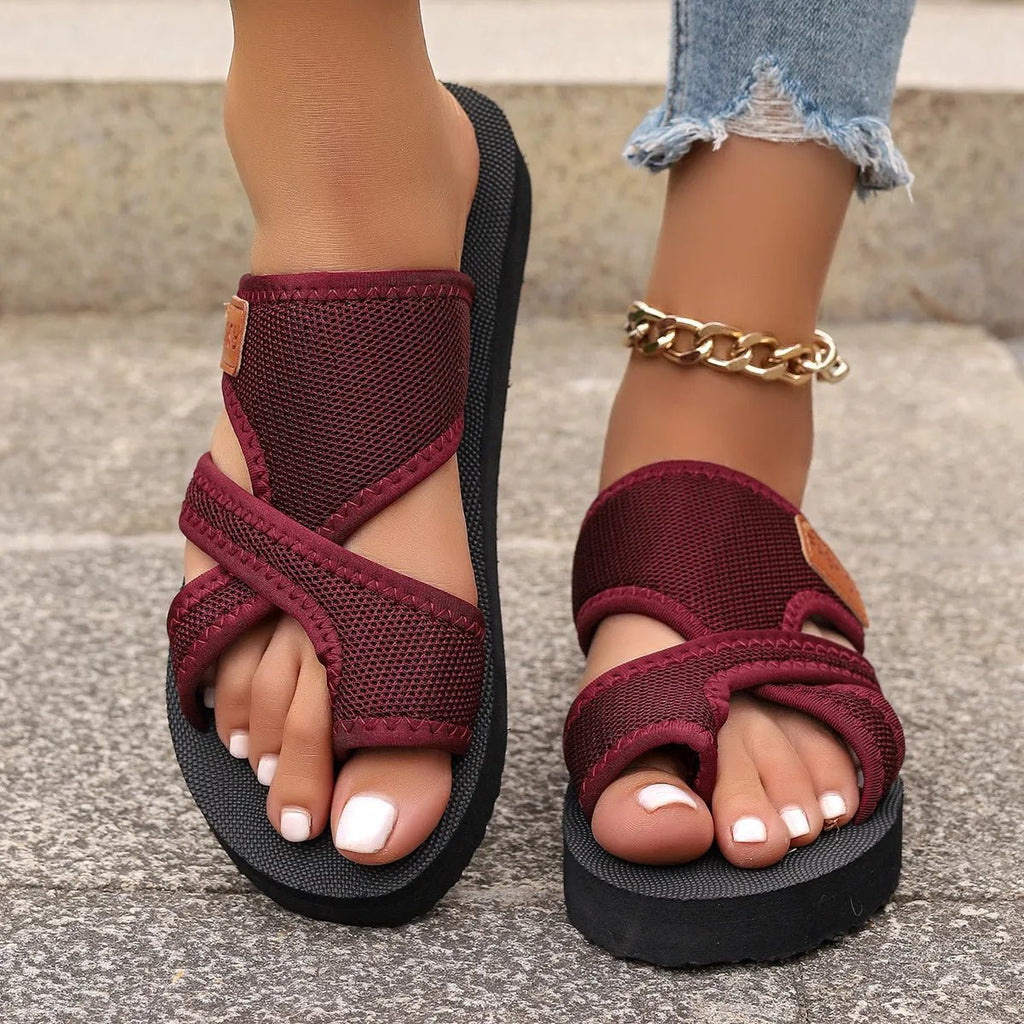 Women's open-toe platform flat sandals by Trendsi, stylish summer footwear with a chic design and comfortable flat sole.