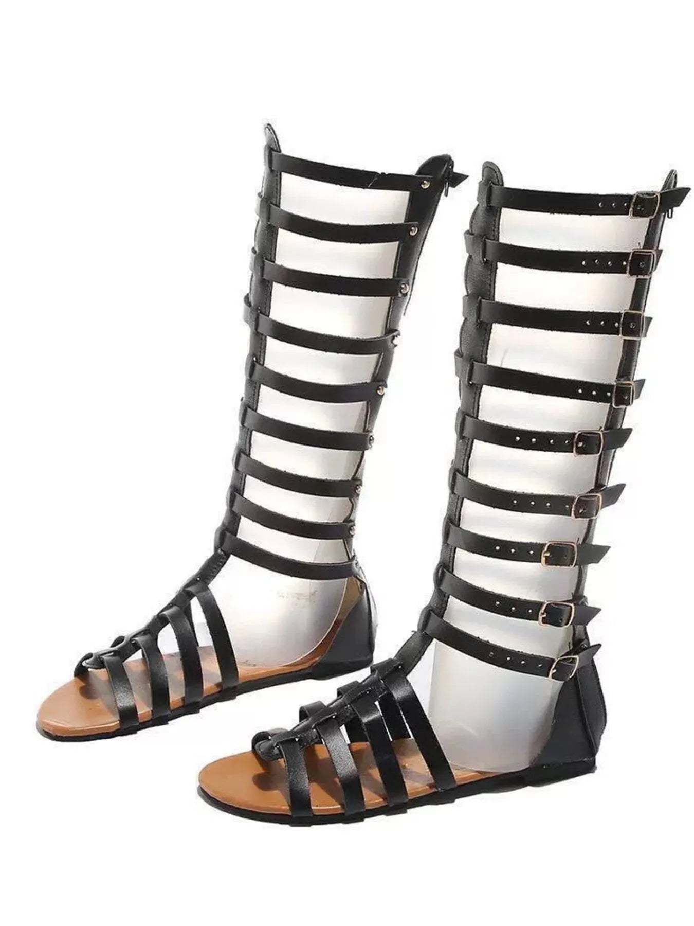 Women's strappy flat sandals with multiple buckles, made from comfortable vegan leather, perfect for casual summer wear.