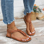 Women's chic PU leather toe post flat sandals from Trendsi, featuring a stylish design perfect for summer footwear.