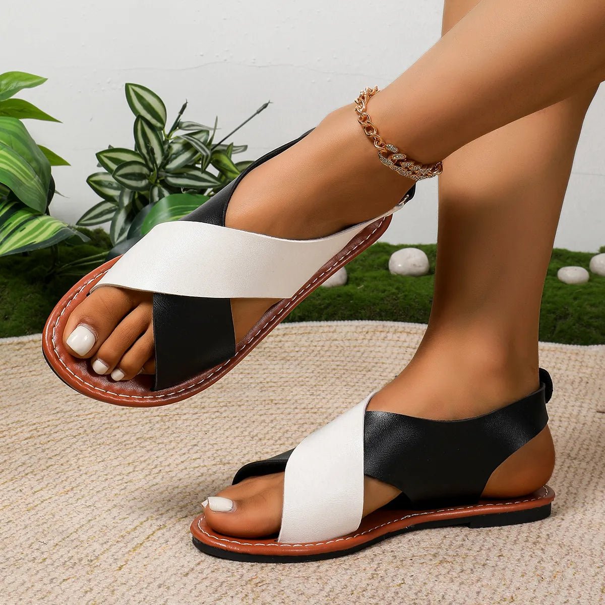 Women's two-tone crisscross strap flat sandals by Trendsi, stylish summer casual footwear with comfortable design.
